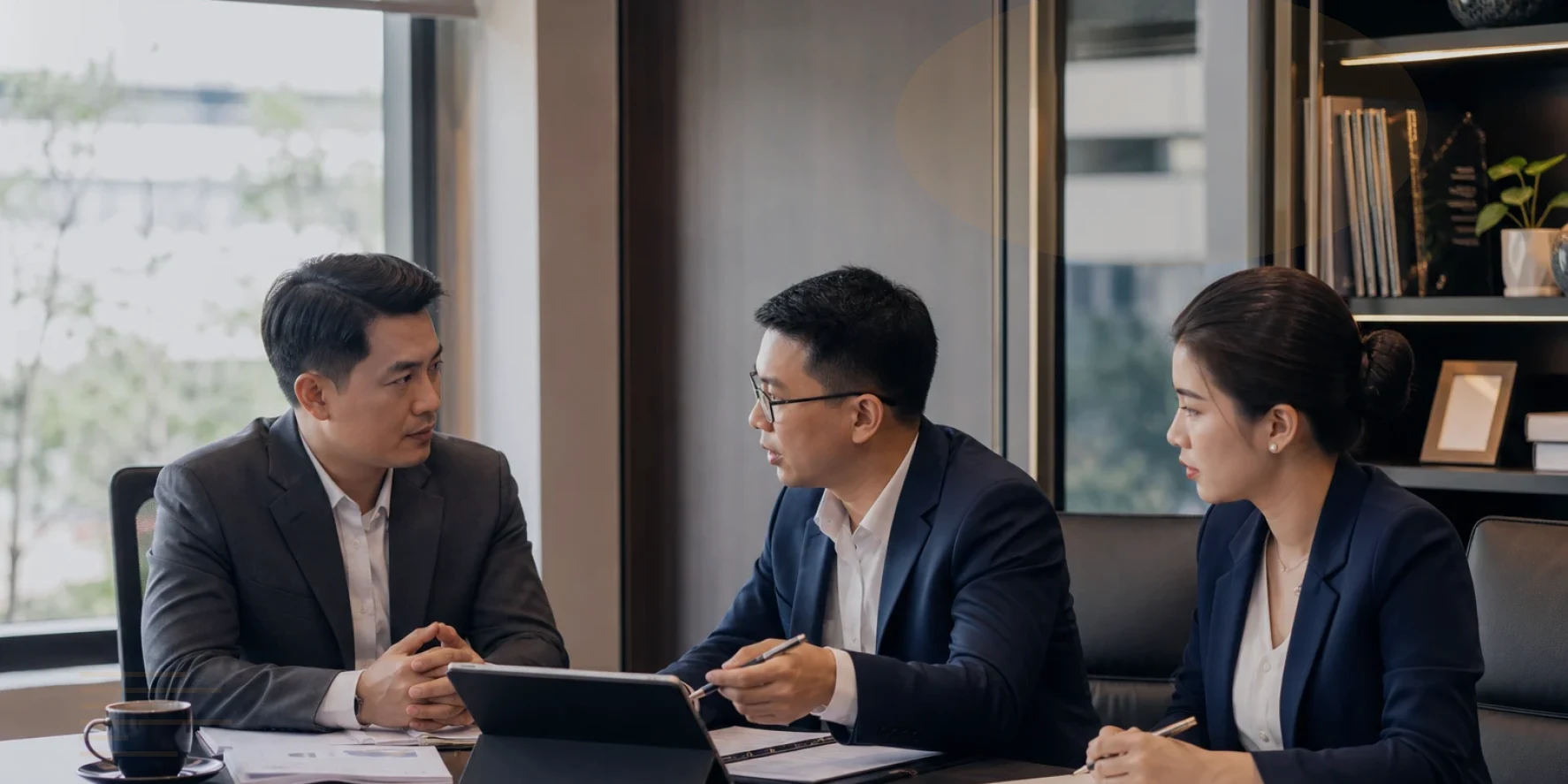 Lawyers and management review the risk matrix before approving action for work permit legal services Vietnam